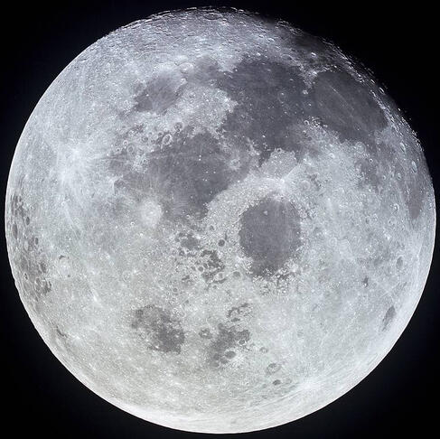 black and white image of the full moon